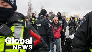 Trucker protests Police clear protesters at Ambassador bridge make arrests [upl. by Fariss]