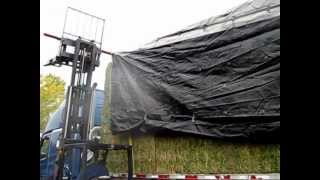 Flatbed Load Tarping Hay Loads UltraTarp System [upl. by Atineg]