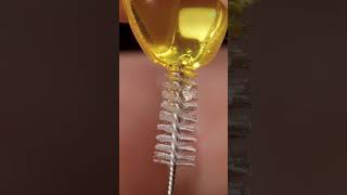 Omega3 and interdental brush satisfyingvideo experiment macro slowmotion [upl. by Aicrag]