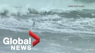 Worlds top surfers brave 50 foot waves in Portugals Praia do Norte [upl. by Ahseirej589]