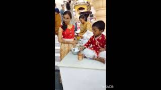 Romapada giving aachamanam to everyone devotees before offering a lamplampharekrishnamantra ram [upl. by Etteniuqna312]