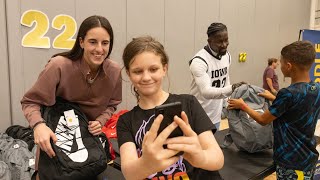 Caitlin Clark Donates Backpacks to Des Moines Students [upl. by Erialcyram]