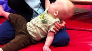 Baby with Down Syndrome learning to crawl at physical therapy [upl. by Estevan149]