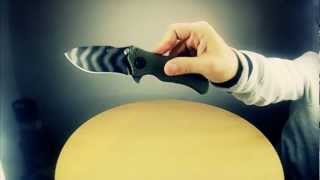 Folding knives in slow motion [upl. by Laeahcim]