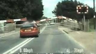 Amazing highspeed police chase as car smashes through level crossing barrier [upl. by Malkin]