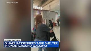 OHare Airport passengers take shelter in underground walkways during storm warnings [upl. by Ketty330]