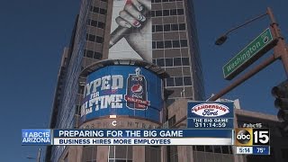 NOW HIRING Businesses bulking up staff ahead of Super Bowl XLIX [upl. by Euhc186]