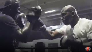 EVANDER HOLYFIELD THROWING FAST COMBINATIONS ON THE PADS AS COMEBACK TRAINING CONTINUES [upl. by Nahshunn840]