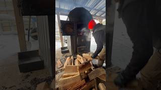 Loading the Central Boiler Classic Edge 550 Outdoor Wood Boiler [upl. by Kora]