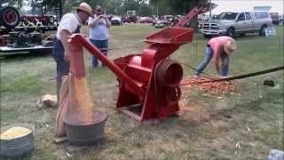 Farmall Cub Shelling corn with a no30 McCormick Sheller [upl. by Margaretha]