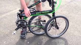 Folding and unfolding Bike Friday to keep on chain [upl. by Yenahs]