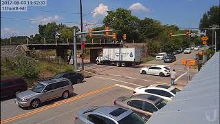 Box truck tries to sneak under the 11foot8 bridge [upl. by Aicitan18]