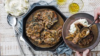 Smothered Pork Chops Recipe  Homemade Gravy and Caramelized Onions [upl. by Ifar]