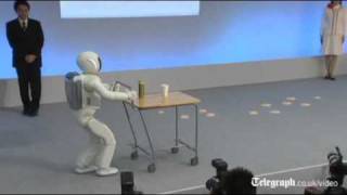 Hondas Asimo robot gets faster and smarter in human makeover [upl. by Annagroeg429]