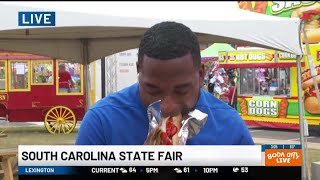 WIS reporter’s big bite at the SC State Fair goes viral [upl. by Oly]