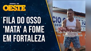 Distribuição de ossos mata a fome de necessitados em Fortaleza Humilhação [upl. by Mauro215]