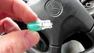 How to replace a light bulb on Mazda 323 instrument dashboard [upl. by Ettelliw]