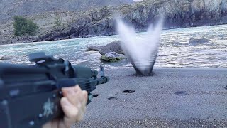 Shooting from the AK TG2 rifle on wet sand in slow motion [upl. by Nakhsa]