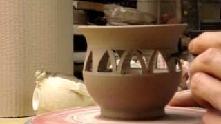 Piercing a pottery clay bowl pierced potters wheel throwing [upl. by Sadella]