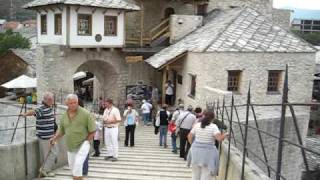 Old bridge  Stari most in Mostar with muezzin [upl. by Fayre431]