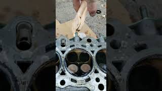 How to check a cylinder head for bent valves with air pressure [upl. by Hurff]