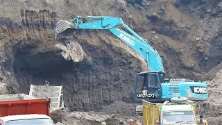 Kobelco SK200 10 Excavator Digging Falling The BIG Stone From The Sand Cliff [upl. by Dihahs]