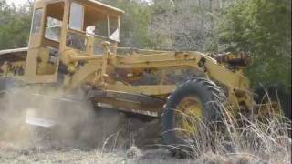 CAT 12 Motorgrader Shaping Road [upl. by Paulita273]