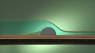 River Geomorphology 43  Hydraulics over a weir  no sediment in flume [upl. by Anyehs]