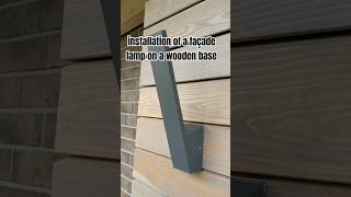 installation of a façade lamp on a wooden base [upl. by Eerrahs]