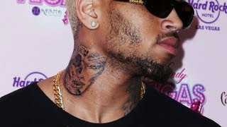 Chris Brown New Neck Tattoo of Rihanna Beaten Face [upl. by Llennehc]