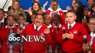 Middle school choir whose Rise Up performance went viral gets surprise from Andra Day [upl. by Fuchs]