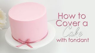 How to Prepare amp Cover a Cake with Icing  Fondant [upl. by Aikemahs581]