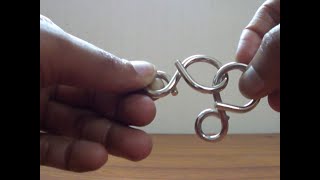 Solution to 8 shaped Metal Ring puzzle [upl. by Ingelbert]