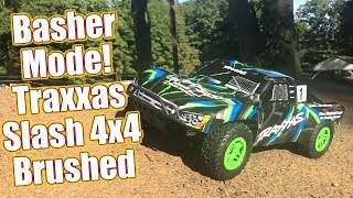 Get Wild Dirty And Even Muddy Traxxas Slash 4x4 Brushed Short Course Review  RC Driver [upl. by Einon251]