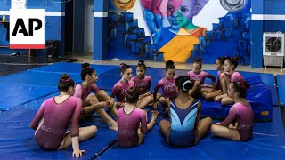 Brazils Olympic champion Rebeca Andrade inspires girls at her hometown gym where career began [upl. by Dabbs252]