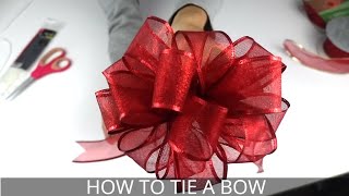 How to Make a Christmas Bow  Easiest BowMaking Method [upl. by Mintun]