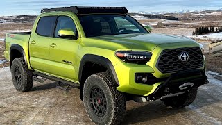 Lifted 2023 Toyota Tacoma TRD Off Road in Lime Rush on 28570R17 Tires [upl. by Nasas]