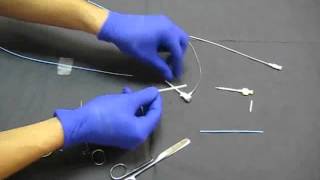 How to shorten a coronary guide catheter [upl. by Ecirahs]