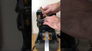 How to Install a Roll of Satin amp printer ribbon in to Zebras ZD220 Printer [upl. by Pepito]