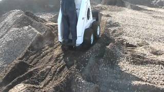 RAMROD Mini Skid Loader 930  working in the dirt pile [upl. by Nyrem]