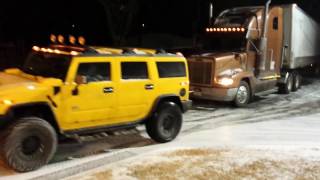 Hummer H2 pulling a semi truck [upl. by Ahsram278]