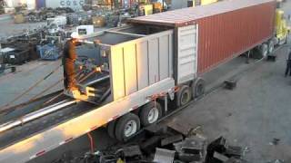 loading metal scrap in containers with machine video [upl. by Chil]