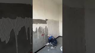 The process of plastering the walls with smooth finishing cement before painting [upl. by Yarvis]