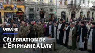 Les militaires et les habitants de Lviv célèbrent lÉpiphanie orthodoxe  AFP [upl. by Jordans338]