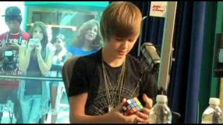 Justin Bieber Playing Rubiks Cube on Radio Disney [upl. by Kciremed]