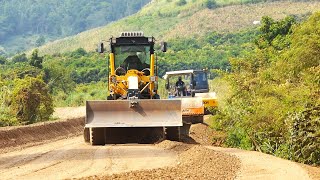 Awesome heavy construction equipment grading and leveling a gravel road with motor grader is at work [upl. by Ettelracs]