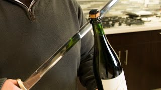 How to open a bottle of champagne with a sword [upl. by Cheffetz]