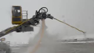 Planes sprayed with antiicing fluid at OHare Airport [upl. by Faber739]