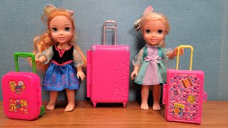 Luggage shopping  Elsa amp Anna toddlers are packing suitcase bags [upl. by Adnuahs]