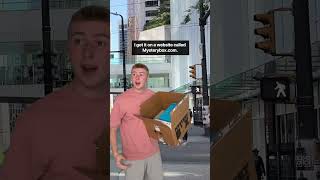 Stranger Stops Pedestrian On The Street With A Mystery Box Shorts [upl. by Atsahs731]